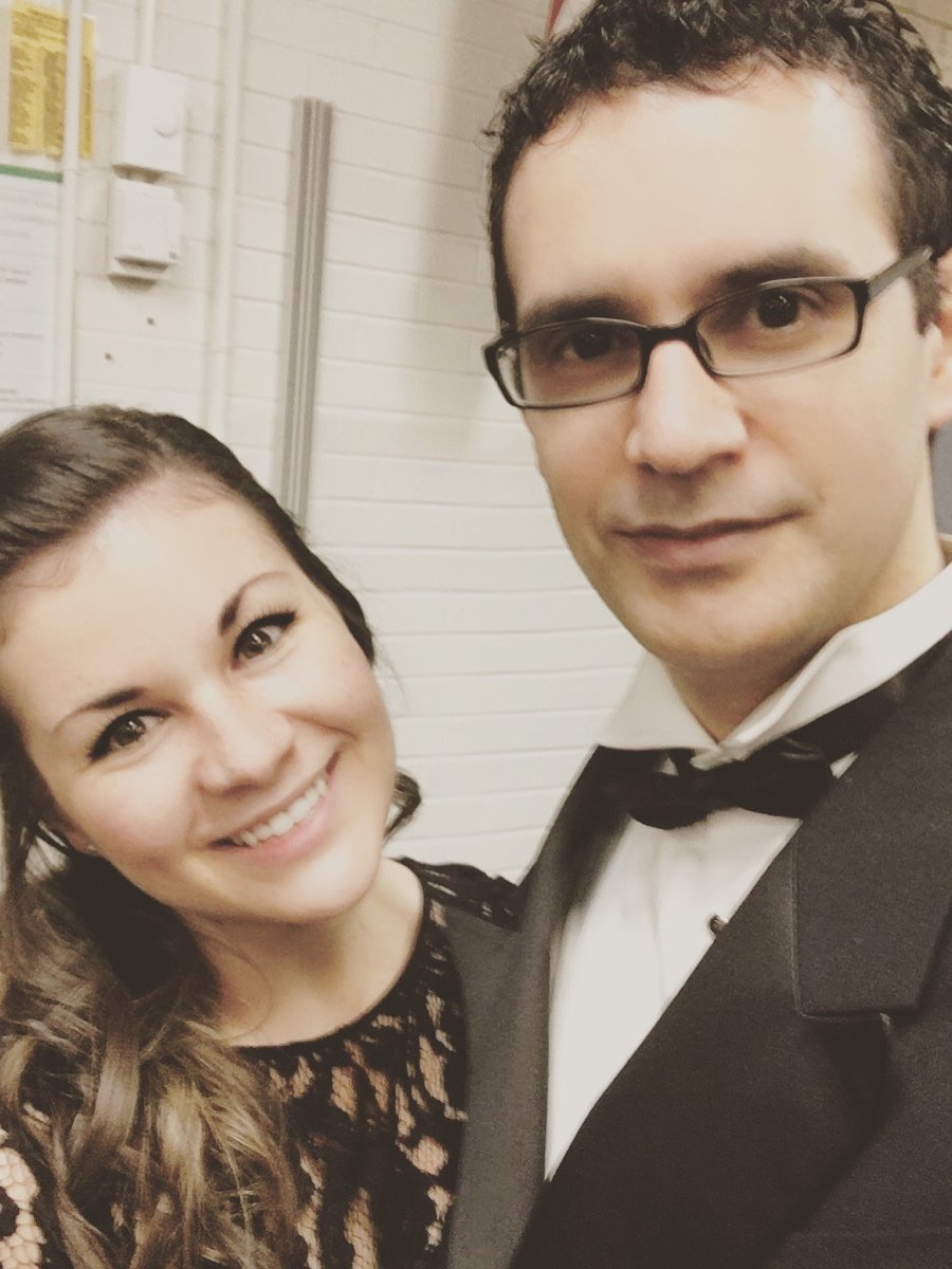 Salena and Jake dressed for a concert, smiling together